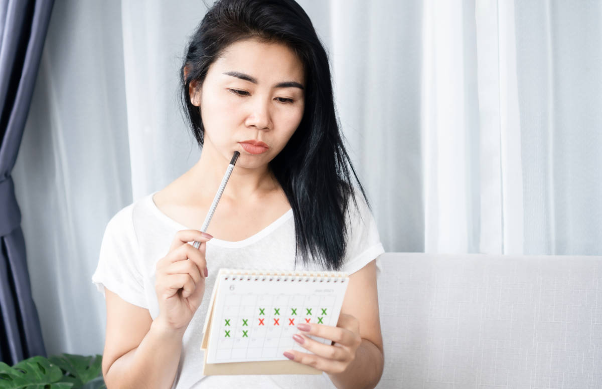 Wanita dengan kalender haid
