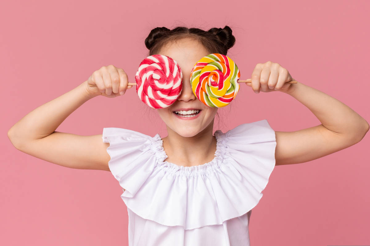 Anak dengan perman lolipop